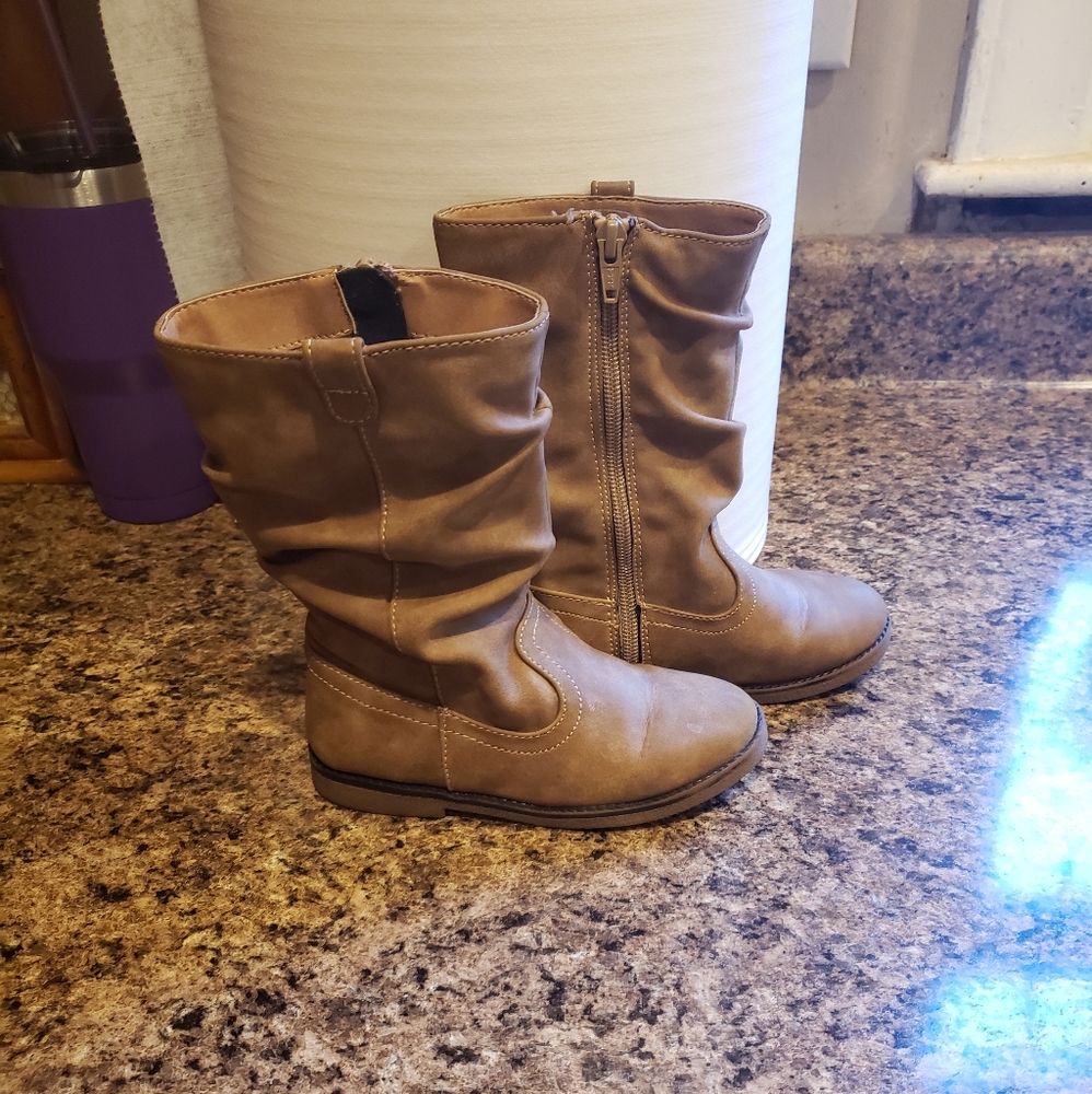 Children place toddler boots